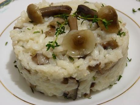 Risotto con funghi famigliole e profumo di timo