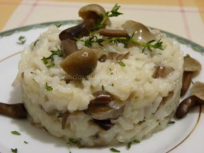 Risotto con funghi famigliole e profumo di timo