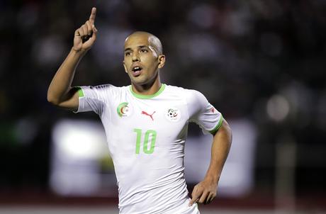 Algeria's Sofiane Feghouli celebrates after scoring a goal against Ethiopia during their African Nations Cup qualifying soccer match at Tchaker Stadium in Blida November 15, 2014. REUTERS/Louafi Larbi (ALGERIA - Tags :SPORT SOCCER) - RTR4EAJY