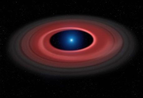 Questa rappresentazione artistica mostra come un asteroide, distrutto dall'enorme forza di gravità di una nana bianca, abbia formato un anello di particelle di polvere e altri detriti in orbita intorno al nucleo stellare spento, di dimensioni pari a quelle della Terra: SDSS J1228+1040. Il gas prodotto dalle collisioni all'interno del disco viene rilevato dalle osservazioni effettuate nell'arco di dodici anni con il VLT dell'ESO e si mostra in un sottile arco luminoso. Crediti: Mark Garlick (www.markgarlick.com) and University of Warwick/ESO