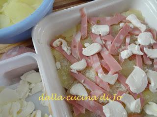 Gratin di patate, treccia di mozzarella e mortadella