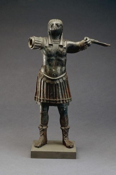 Standing-figure-of-the-Roman-god-Horus-wearing-Roman-military-costume-bronze-Egypt-1st-2nd