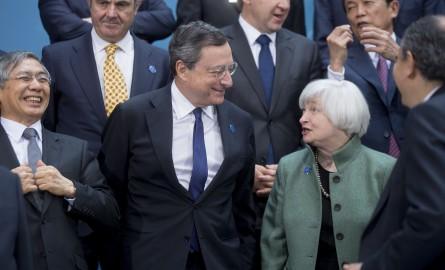 Haruhiko Kuroda, governor of the Bank of Japan (BOJ), from left, Mario Draghi, president of the European Central Bank (ECB), and Janet Yellen, chair of the U.S. Federal Reserve, attend the Group-of-20 (G-20) finance ministers and central bank governors...