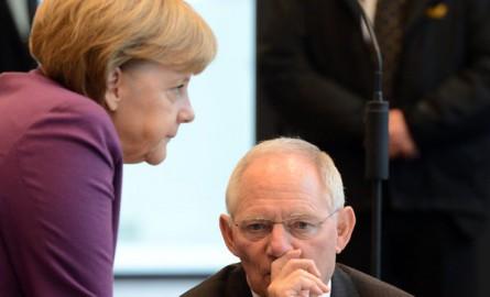 Federal Chancellor Angela Merkel and Federal Minister of Finance Wolfgang Schäuble (both CDU) talk at the beginning of the special parliamentary meeting of the CDU in Berlin, Germany, 22.03.2013. Photo: Soeren Stache