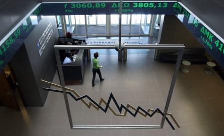 Stock price tickers flash green, indicating gains, at the Athens stock exchange on Friday, April 23, 2010. Shortly later, Prime Minister George Papandreou called for the activation of a joint eurozone-International Monetary Fund financial rescue to pul...