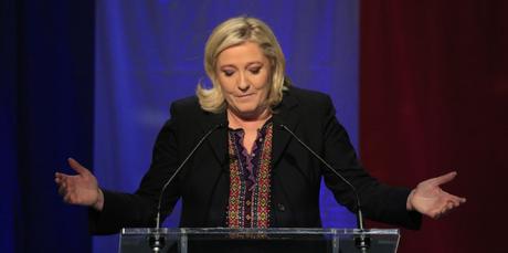 Far Right National Front party leader Marine Le Pen delivers her speech after the results of the second round of the regional elections in Henin-Beaumont, northern France, Sunday Dec.13, 2015. Marine Le Pen's far-right National Front collapsed in French regional elections Sunday after dominating the first round of voting, according to pollsters' projections. (AP Photo/Thibault Camus)