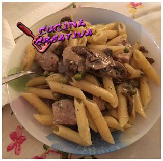 pasta ai piselli, funghi e salsiccia