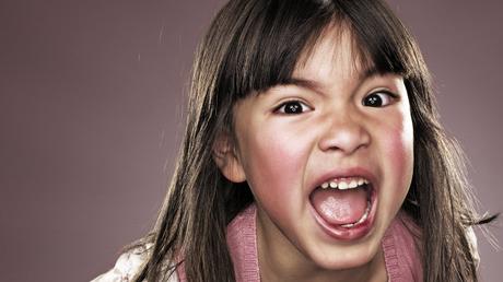 Young girl shouting to camera. (Stuart McClymont/Getty Images)