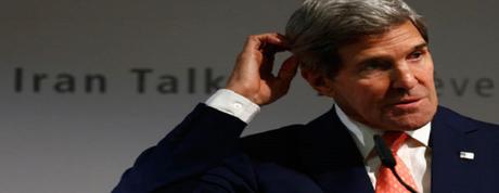 U.S. Secretary of State John Kerry gestures during a news conference after nuclear talks in Geneva