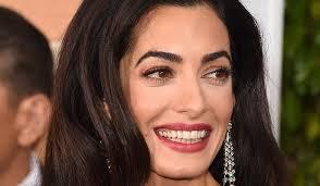 Amal Alamuddin in forma smagliante