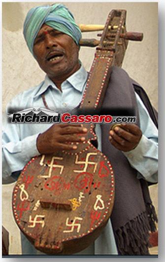 Indian-Hindu-with-swastika-guitar