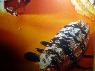 churros con salsa di cioccolato