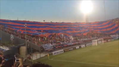 (VIDEO)Fans of Cerro Porteño with giant flag vs Cobresal in Coppa Libertadores 25.2.2016