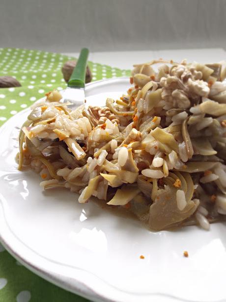 Risotto allo spumante e carciofi con noci e polvere d'arancia