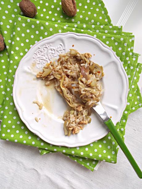 Risotto allo spumante e carciofi con noci e polvere d'arancia