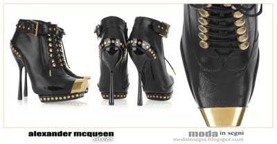 ALEXANDER MCQUEEN Studded leather brass-toe ankle boots... nel guardaroba di Moda in Segni