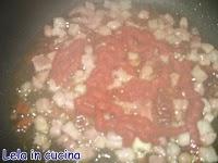 'e puntiglius con pomodori secchi sott'olio,pancetta e canellini