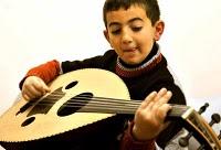 I bambini di Gaza tornano alla scuola musicale di al-Qattan