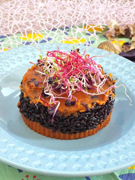 Riso nero con crema di zucca e germogli Riso nero con crema di zucca e germogli