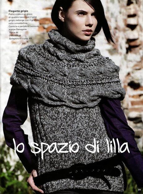 Moda donna ai ferri: maglione invernale con sprone a trecce Moda donna ai ferri: maglione invernale con sprone a trecce