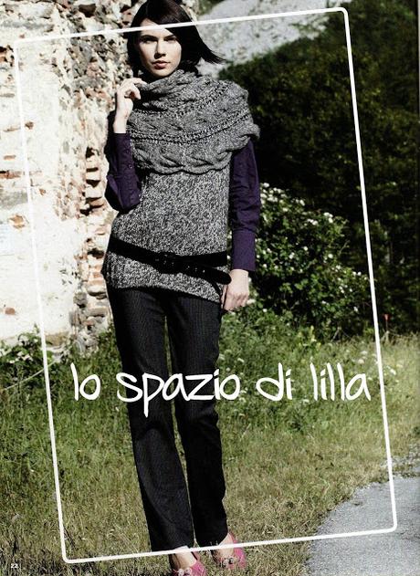 Moda donna ai ferri: maglione invernale con sprone a trecce Moda donna ai ferri: maglione invernale con sprone a trecce