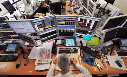 A trader has lunch in front of computers screens on August 19, 2011 at the office of the French investment company Aurel BGC in Paris. Global stocks tumbled further and safe bet gold surged to new records on August 19, 2011 on mounting fears of fresh g... A trader has lunch in front of computers screens on August 19, 2011 at the office of the French investment company Aurel BGC in Paris. Global stocks tumbled further and safe bet gold surged to new records on August 19, 2011 on mounting fears of fresh g...