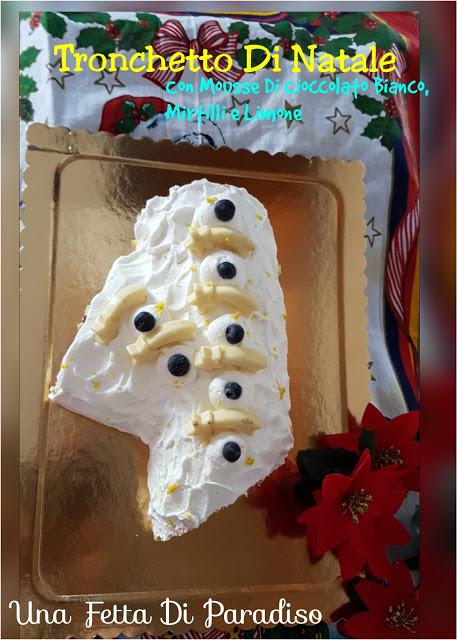 Tronchetto Di Natale Con Mousse Di Cioccolato Bianco, Mirtilli e Limone Tronchetto Di Natale Con Mousse Di Cioccolato Bianco, Mirtilli e Limone