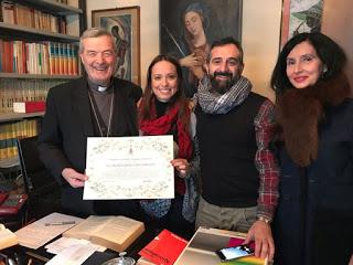 Il riconoscimento “Burghžàn d'istãn” al Vescovo Emerito Mons. Carlo Mazza Il riconoscimento “Burghžàn d'istãn” al Vescovo Emerito Mons. Carlo Mazza