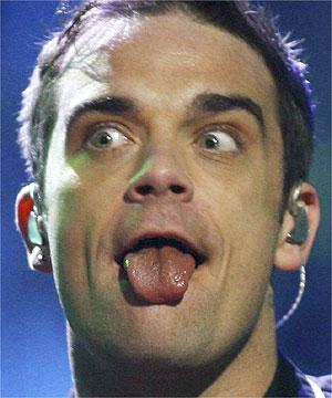 Robbie Williams si dopa per la topa