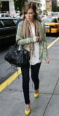 hilary duff yellow shoes   green sweater