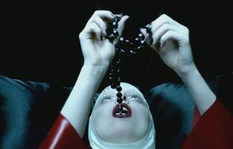 http://www.projectinspired.com/wp-content/uploads/lady-gaga-swallows-rosary.jpg