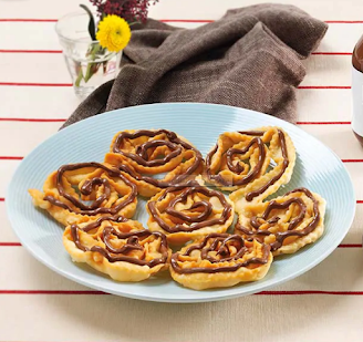 Le Cartellate sono tra i dolci più tipici della tradizione pugliese. Le Cartellate sono tra i dolci più tipici della tradizione pugliese.