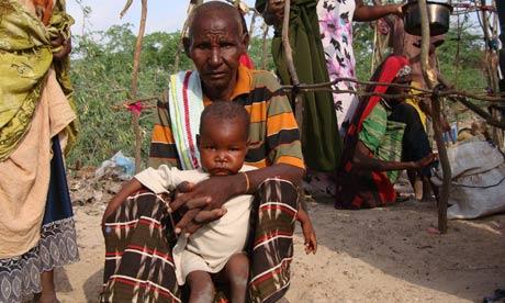 Refugee waits for food aid in Mogadishu