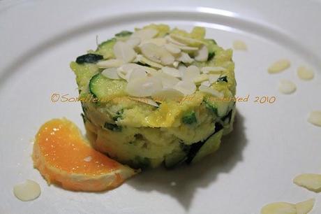 Cous cous mandorlato agli agrumi e zucchine.