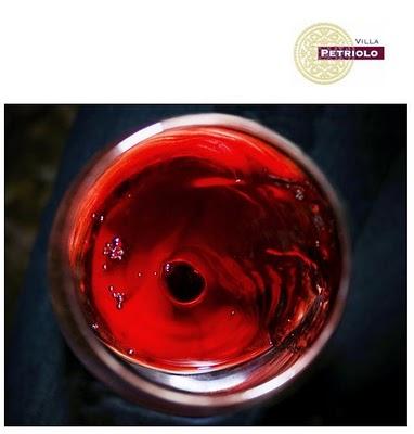 Nel vino, la liquida  luce della prugna...