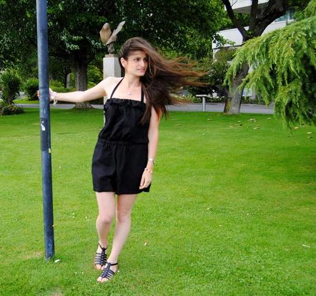 Black Jumpsuit and Gladiator Sandals