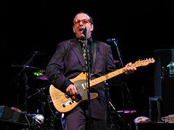 http://upload.wikimedia.org/wikipedia/commons/thumb/e/e4/Elvis_Costello_15_June_2005.jpg/250px-Elvis_Costello_15_June_2005.jpg