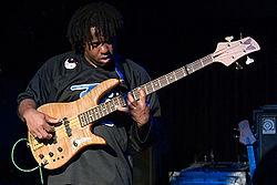http://upload.wikimedia.org/wikipedia/commons/thumb/a/a9/Victor_Wooten_2.jpg/250px-Victor_Wooten_2.jpg