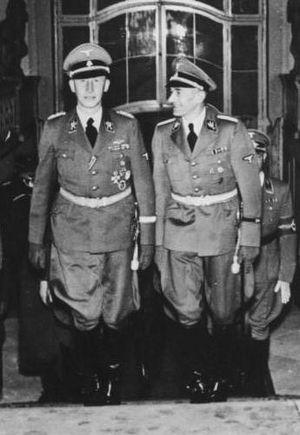 Heydrich (left) at Prague Castle in 1941. To H...
