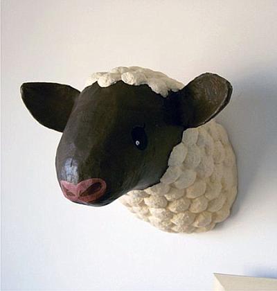 http://www.ohdeedoh.com/ohdeedoh/decorative-accessories-pillows/12-sources-for-faux-taxidermy-animal-heads-155933