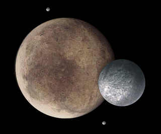 Le foto di Plutone svelano i ghiacci di Caronte