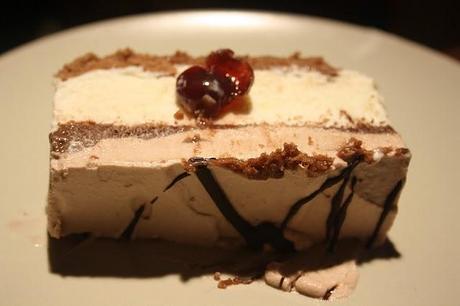 Semifreddo al cioccolato bianco cacao ed amarene  -Parfait with white chocolate and dark chocolate.