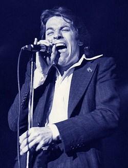 http://upload.wikimedia.org/wikipedia/commons/7/7a/Robert-Palmer-Sunset-Strip-%28edit%29.jpg