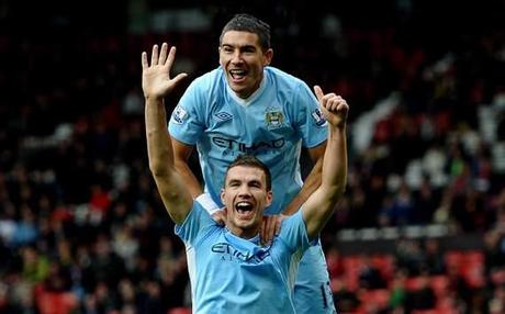 EPL - Manchester United v Manchester City,Edin Dzeko and Aleksandar Kolarov  