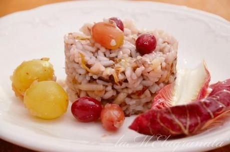 Risotto al radicchio trevigiano, con uva e taleggio.