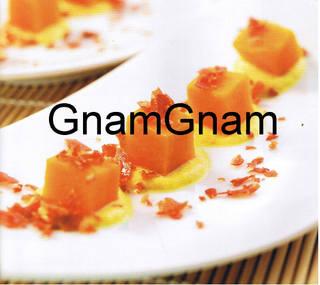 Cubetti di zucca con parmigiano e polvere di prosciutto