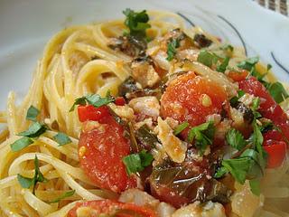 Spaghetti con stoccafisso e pomodorini.