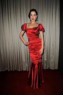 Dita Von Teese sexy in Dolce & Gabbana Rouge Satin