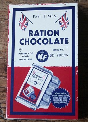 Stocked up with sweet memories: These old tins are purely for decoration, as is this period chocolate advert 