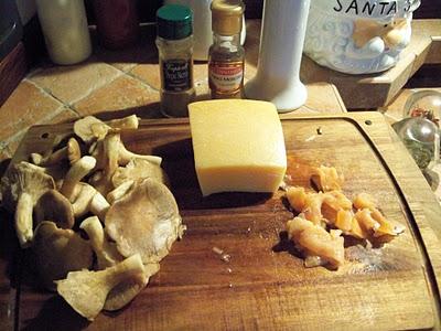 Risotto al parmigiano con funghi di bosco e salmone